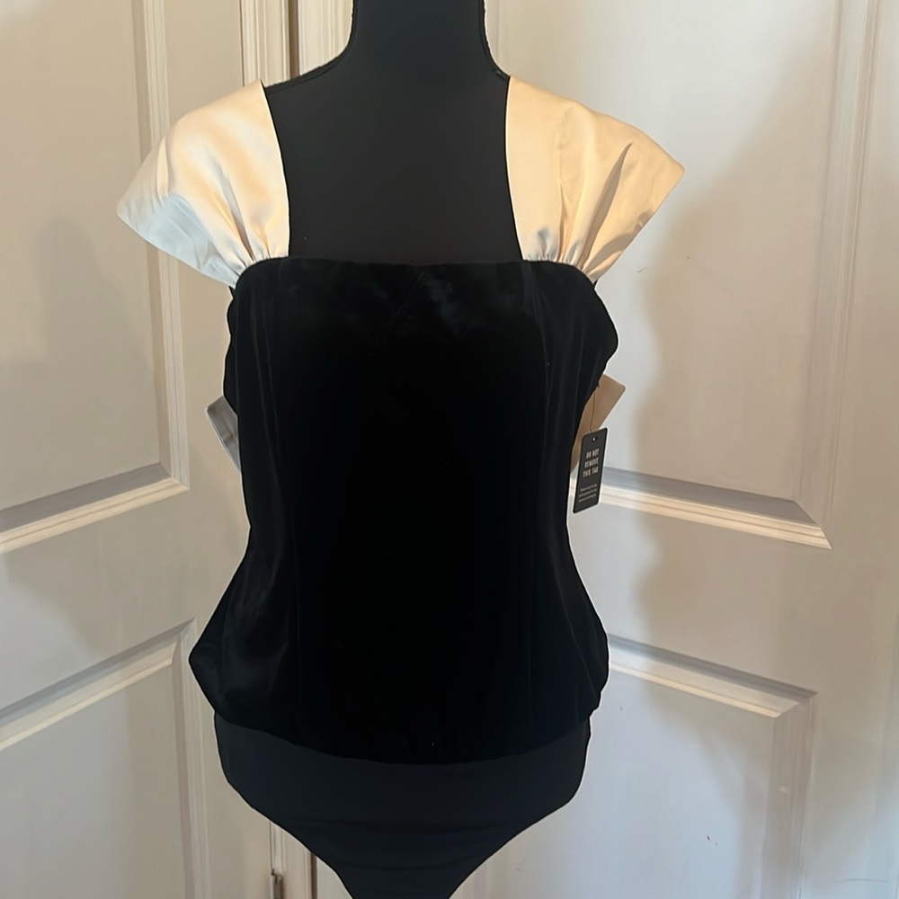 Express velour body suit brand new with tags 
NEXT DAY SHIPPING